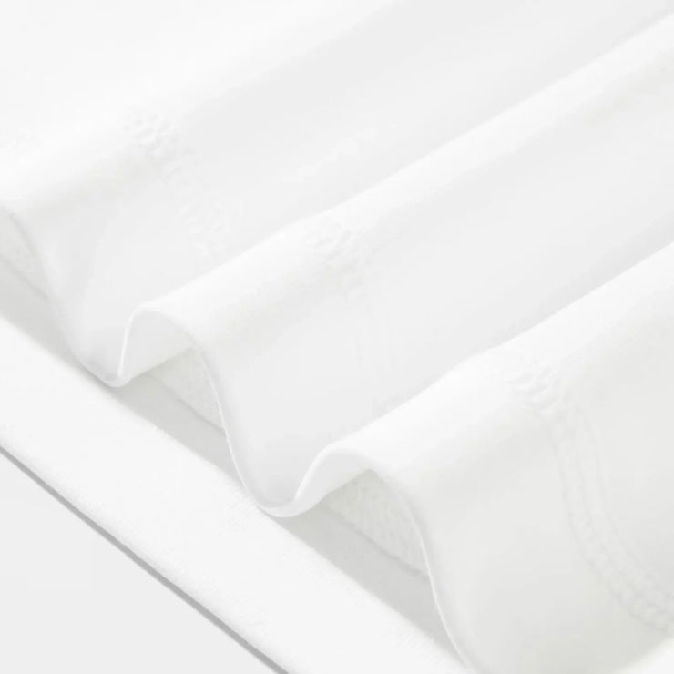 Close-up of white Fresh Faith Designs T-Shirt fabric showcasing smooth texture in Bible verse religious apparel