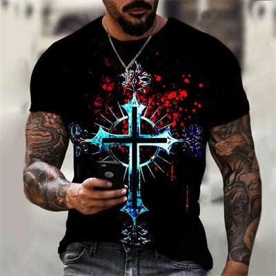 Man wearing a black casual faith graphic t-shirt with a large blue cross and red splatter design