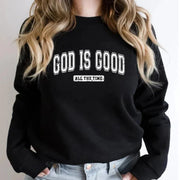 Black sweatshirt from Fresh Faith Designs with God is Good all the time text in Christian apparel for women