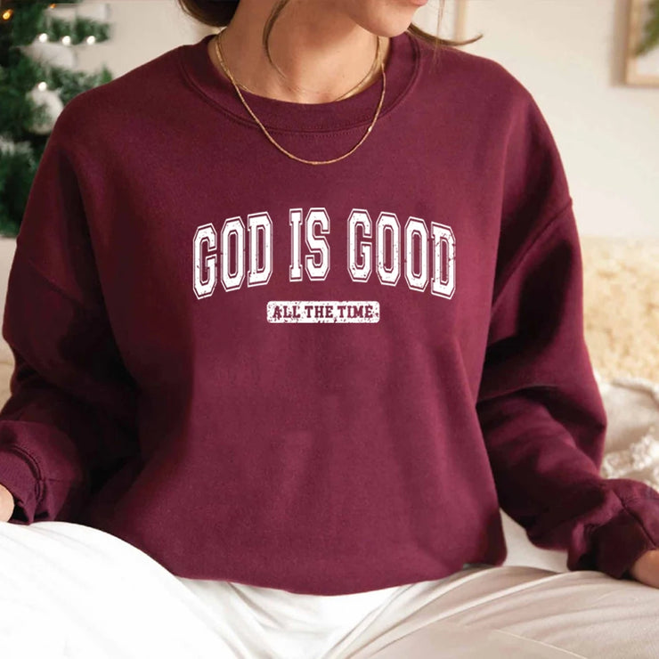 Maroon sweatshirt with God is Good printed in white, Christian apparel for women by Fresh Faith Designs