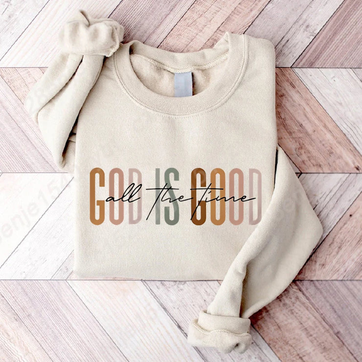 Beige folded sweatshirt with God is good all the time design Christian clothing women by Fresh Faith Designs