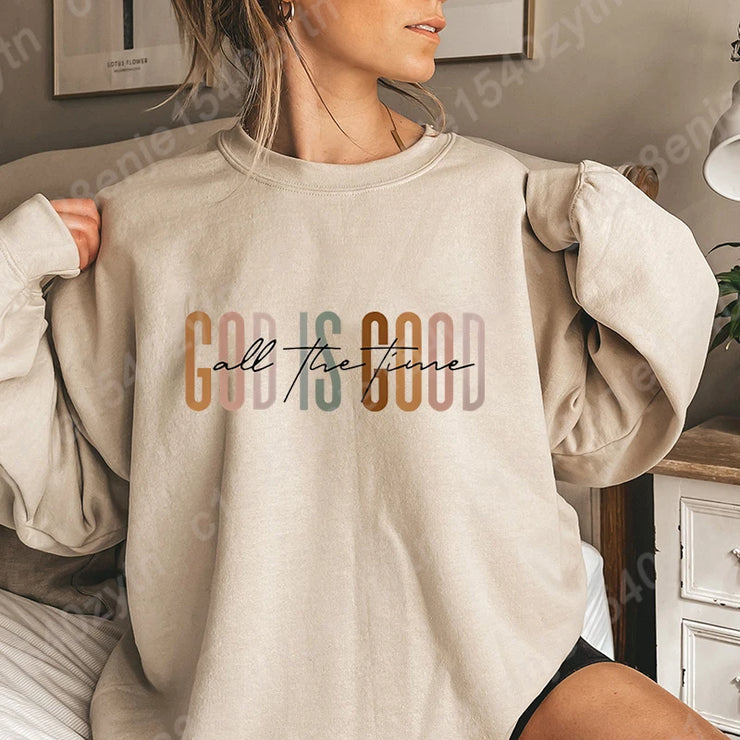 Beige sweatshirt with God is good all the time text Christian clothing women by Fresh Faith Designs