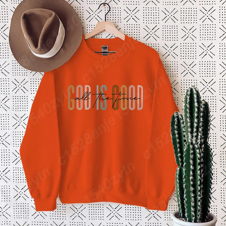 Orange sweatshirt with God is good all the time text Christian clothing women from Fresh Faith Designs