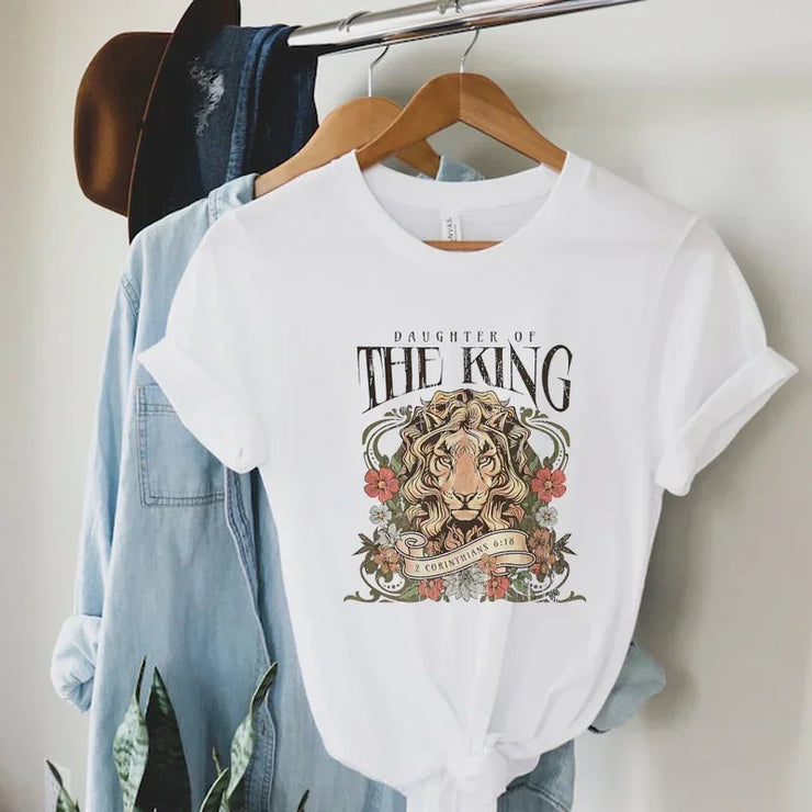 Fresh Faith Designs Christian graphic tee for women white shirt with lion and Bible verse design