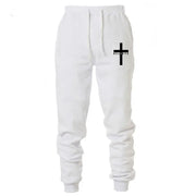 White Christian jogging pants with black cross and believe text on left thigh by Fresh Faith Designs