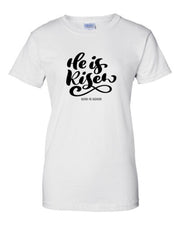 White Fresh Faith Designs t-shirt with He is Risen black lettering for Christian seasonal clothing