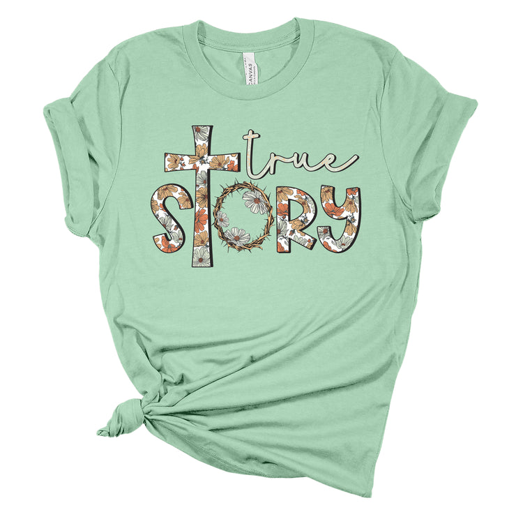 Fresh Faith Designs green t-shirt with floral cross and true story print Christian seasonal clothing