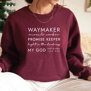 Maroon Christian women's sweatshirt by Fresh Faith Designs with inspirational faith-based text