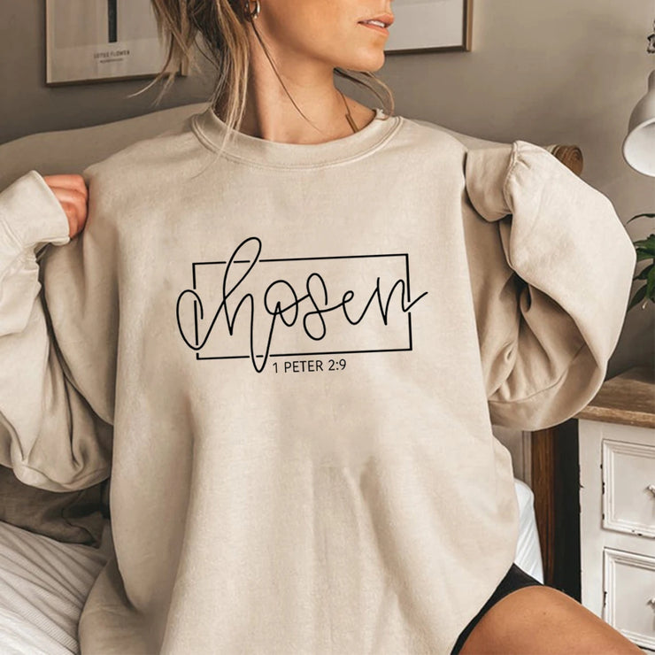 Beige Christian women's sweatshirt with chosen graphic and 1 Peter 2:9 scripture design