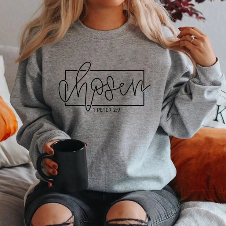 Gray Christian women's sweatshirt from Fresh Faith Designs with chosen 1 Peter 2:9 scripture print