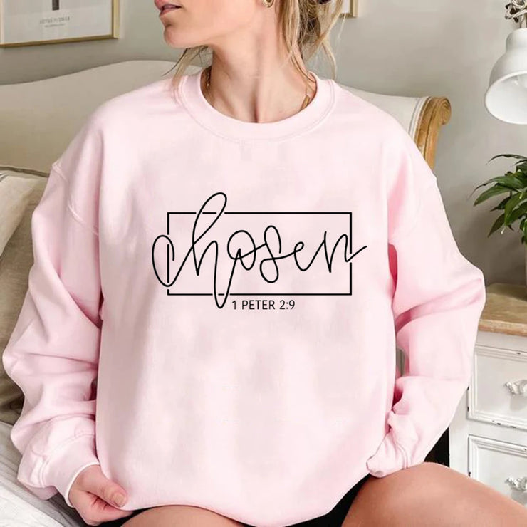 Light pink Christian women's sweatshirt with chosen 1 Peter 2 9 scripture design by Fresh Faith Designs