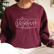 Burgundy Christian women's sweatshirt with chosen 1 Peter 2:9 scripture design by Fresh Faith Designs