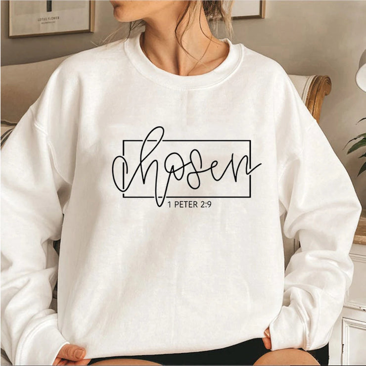 White Christian women's sweatshirt with chosen 1 Peter 2:9 scripture design by Fresh Faith Designs