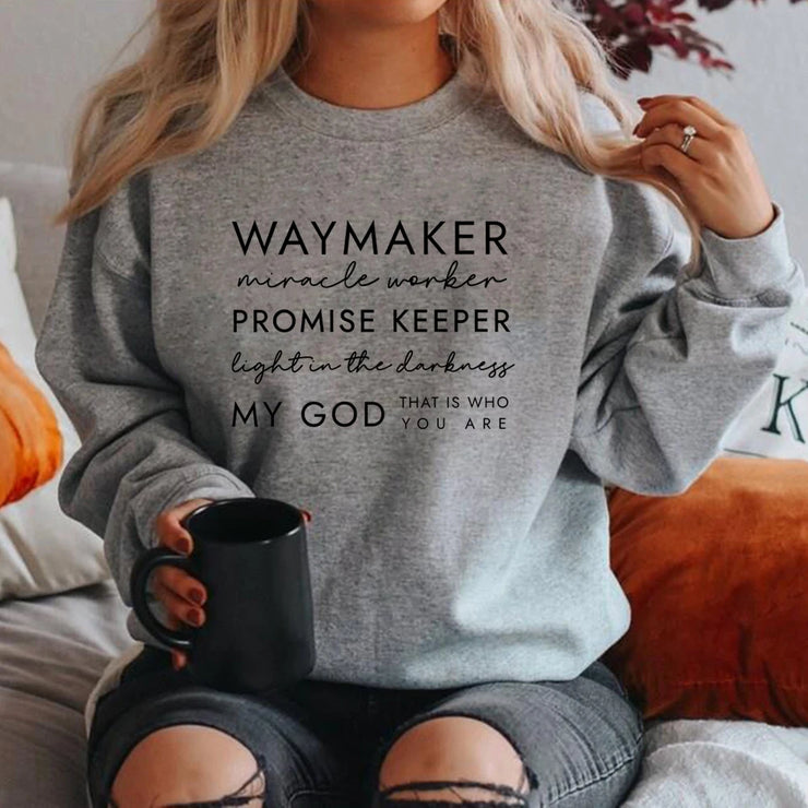 Gray Christian women's sweatshirt with inspirational faith text Waymaker Promise Keeper design