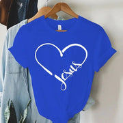 Blue Christian women's t-shirt with white heart and Jesus script design hanging on wooden hanger