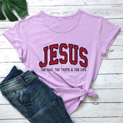 Lavender Christian women's vintage t-shirt with Jesus graphic and text paired with blue denim jeans