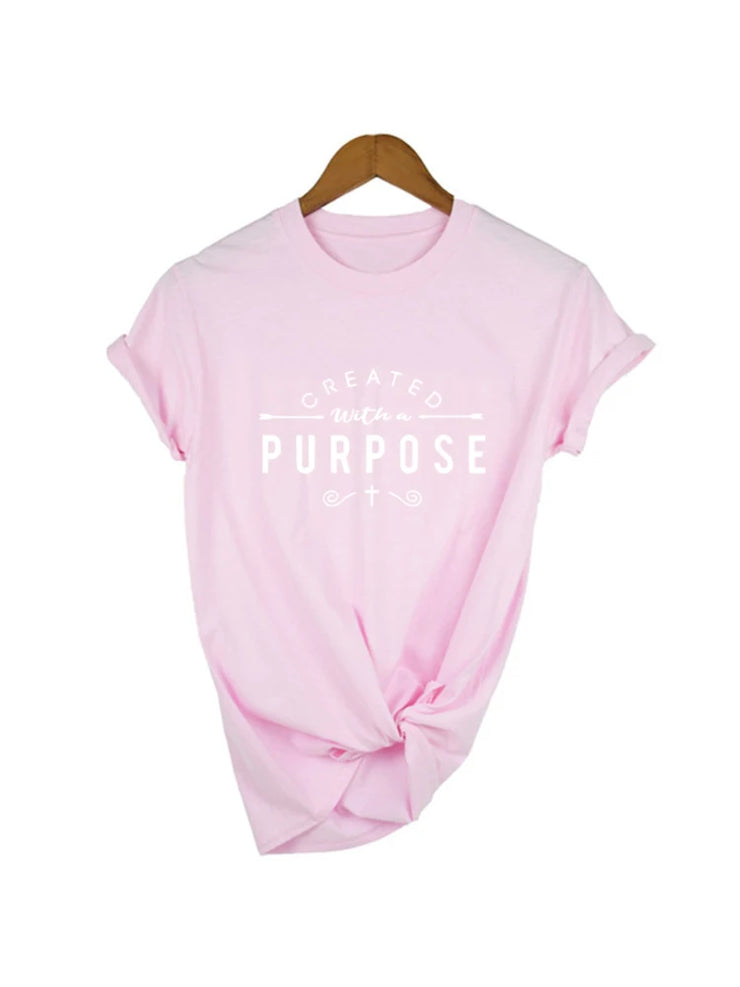 Pink Created with a Purpose shirt by Fresh Faith Designs with white motivational text and knot detail