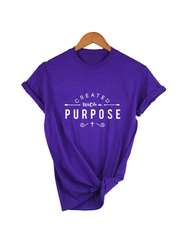 Purple Created with a Purpose shirt by Fresh Faith Designs with white inspirational text and a cross
