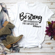 White t-shirt with Be strong and courageous Joshua 1:9 scripture print faith based apparel