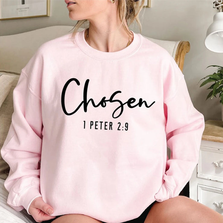Pink sweatshirt with Chosen 1 Peter 2 9 text faith based apparel by Fresh Faith Designs
