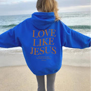 Blue hoodie with Love Like Jesus printed on the back from Fresh Faith Designs faith based apparel