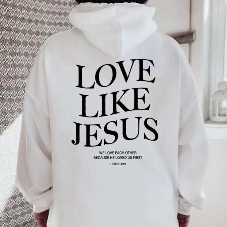 White hoodie with Love Like Jesus text and Bible verse design in faith based apparel