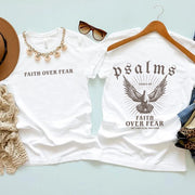 Fresh Faith Designs white t-shirts with Faith Based Apparel slogan Faith Over Fear and Psalms graphic with dove