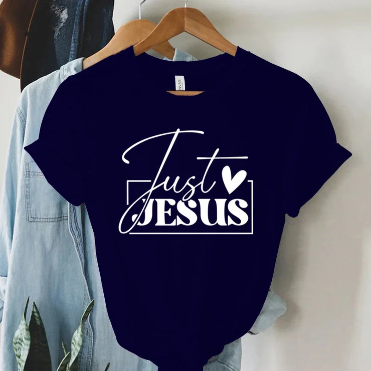 Navy blue faith-based women's apparel t-shirt with Just Jesus white graphic print on hanger