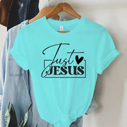 Light blue faith-based women's apparel T-shirt with Just Jesus black text and heart design