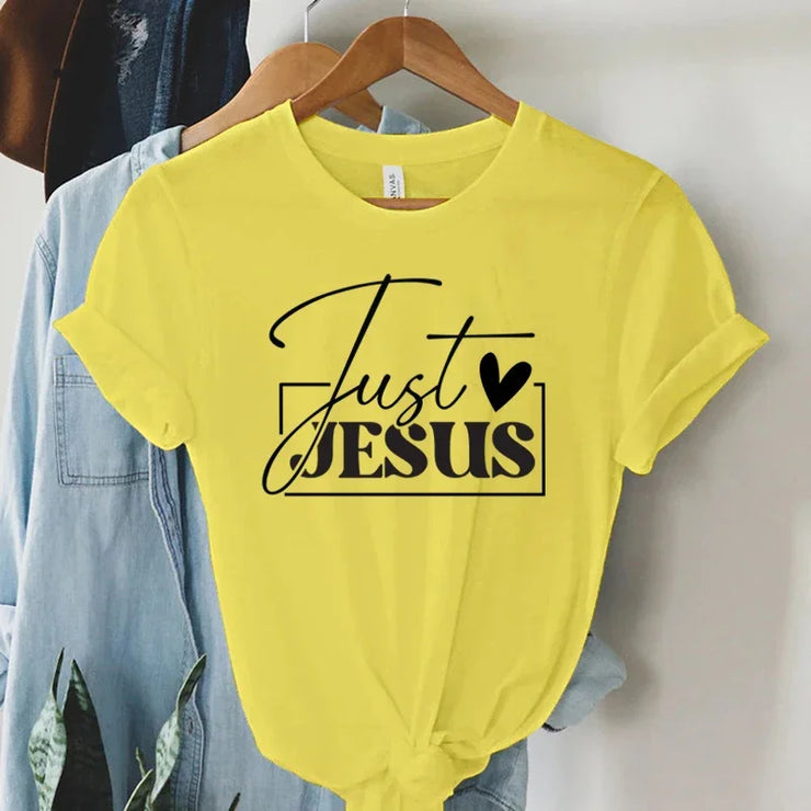 Yellow faith-based women's apparel t-shirt with Just Jesus graphic and heart design