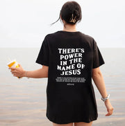 Black faith based women's apparel t-shirt with white text design featuring a Bible verse from Acts 4:12