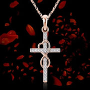 Elegant faith-inspired pendant jewelry featuring a sparkling cross with an infinity heart design on a delicate chain