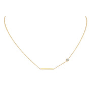 Delicate gold necklace with a horizontal bar and small clear stone faith jewelry for women