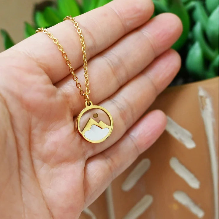 Gold necklace with mountain and sun pendant by Fresh Faith Designs faith jewelry for women