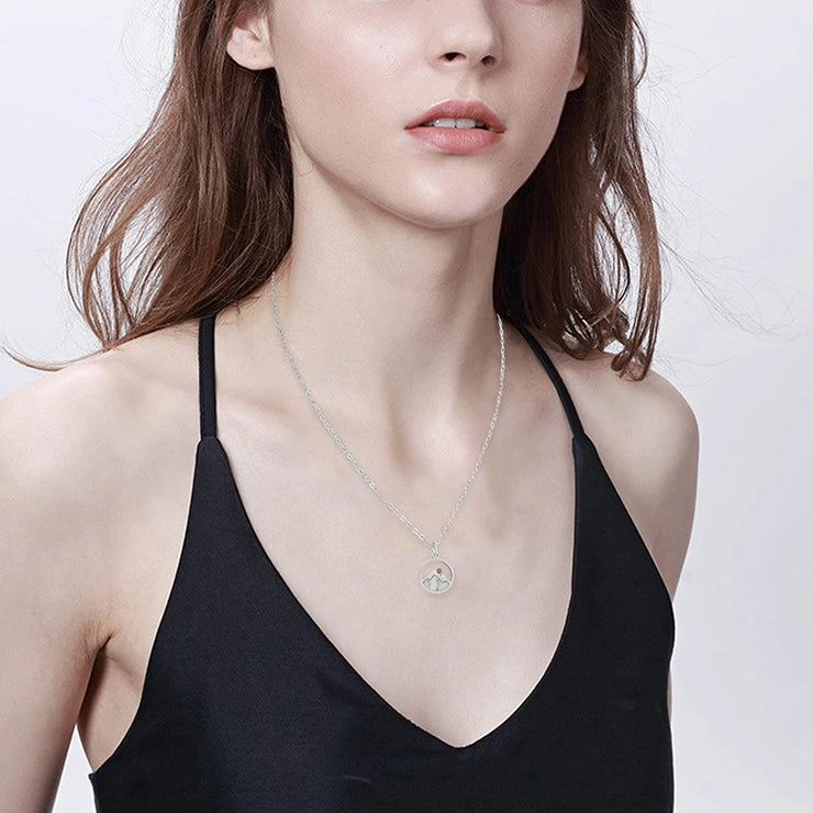 Fresh Faith Designs silver necklace worn by woman showcasing faith jewelry for women in elegant style