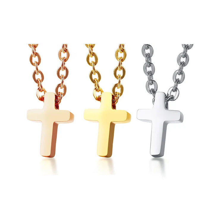 Faith jewelry for women featuring three cross pendant necklaces in rose gold, yellow gold, and silver
