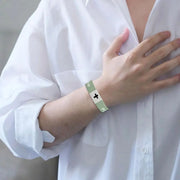 Fresh Faith Designs NFC religious jewelry bracelet with cross symbol worn on wrist