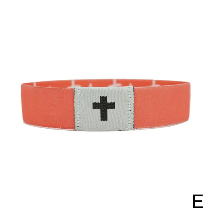 Fresh Faith Designs orange bracelet with cross emblem NFC religious jewelry for faith and connectivity