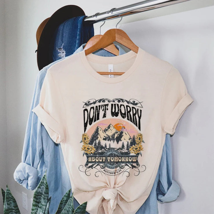Fresh Faith Designs ladies religious graphic tees with mountain and sunflower design in beige
