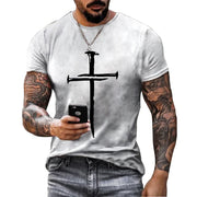 Men's Christian Cross T-shirt in white with black cross nail design worn by tattooed man