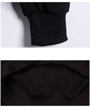 Close-up details of black sleeve and fabric texture from Fresh Faith Designs religious casual apparel