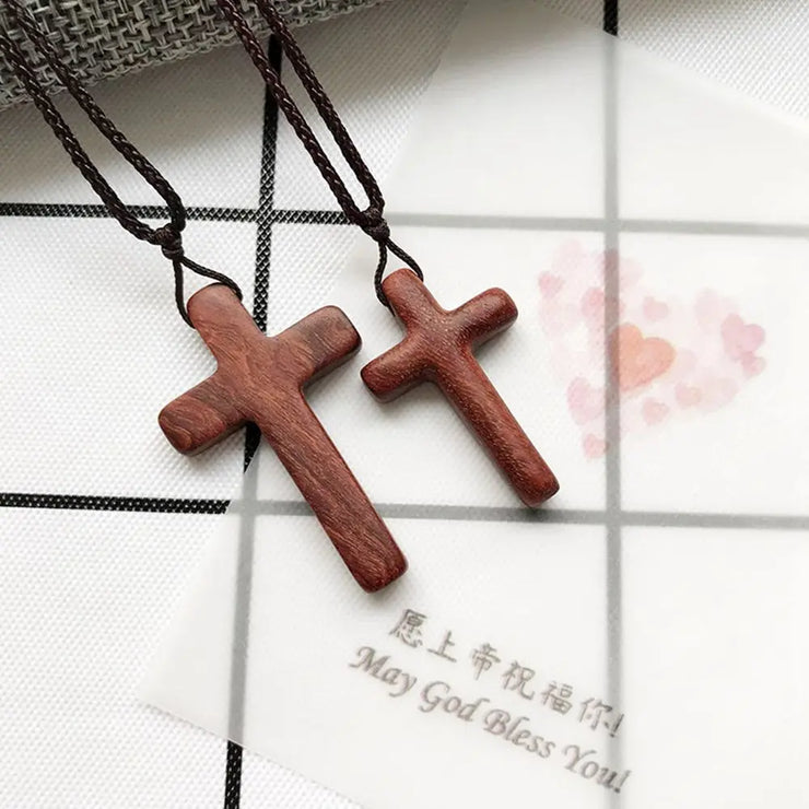 Religious cross necklace for men and women made of polished wooden crosses on brown cords