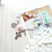 Religious jewelry for women pink bead bracelet with silver cross and rose charms by Fresh Faith Designs