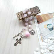 Fresh Faith Designs delicate religious jewelry for women with pink beads and silver cross pendant