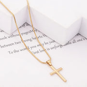 Fresh Faith Designs gold fashion crystal cross necklace with sleek chain on white background