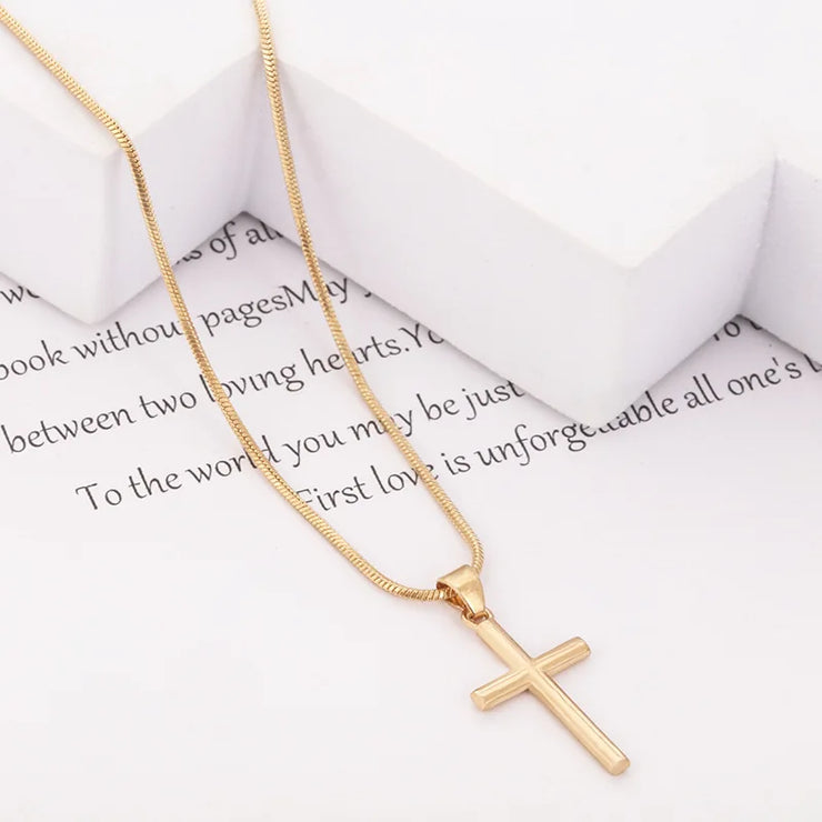 Fresh Faith Designs gold fashion crystal cross necklace with sleek chain on white background