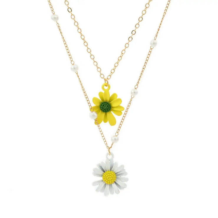 Fresh Faith Designs layered necklace with yellow and white daisy charms and delicate gold chains