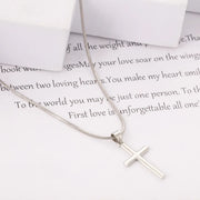 Fashion crystal cross necklace by Fresh Faith Designs with a sleek silver chain on white background