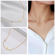 Gold cross necklace with small diamond detail from Fresh Faith Designs women's faith jewelry collection