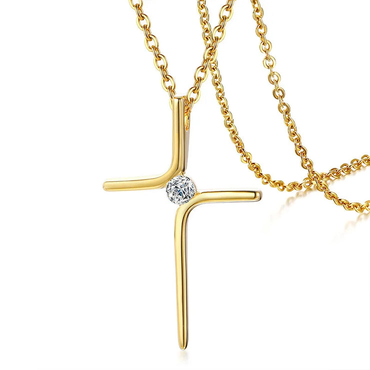 Gold cross necklace with a diamond center pendant on a delicate chain women's faith jewelry